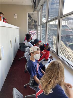 students in press box at Truist Park